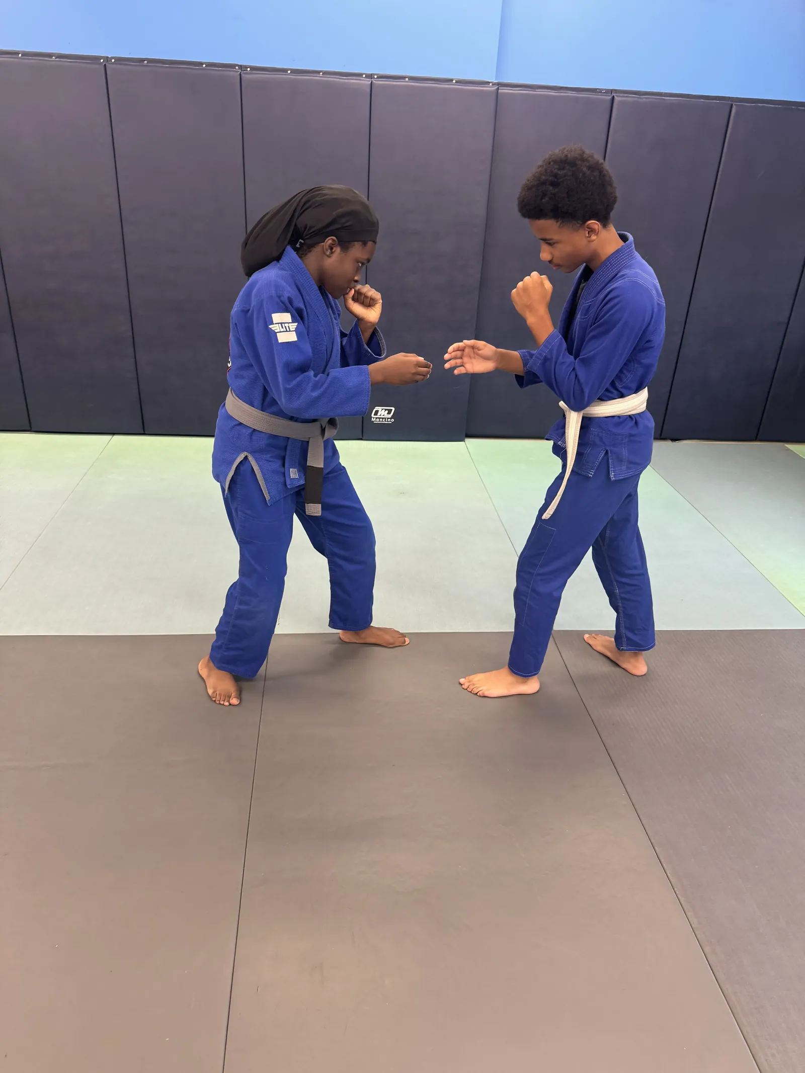Young Elijah BJJ students gripping up in a live training round in Union, New Jersey